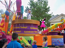 Mickey Mouse leads the Celebrate Dreams Come True Parade down Main Street USA